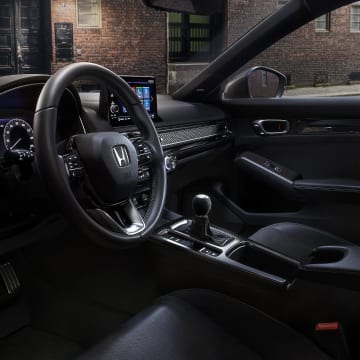 2023 Honda Civic Hatchback steering wheel & console