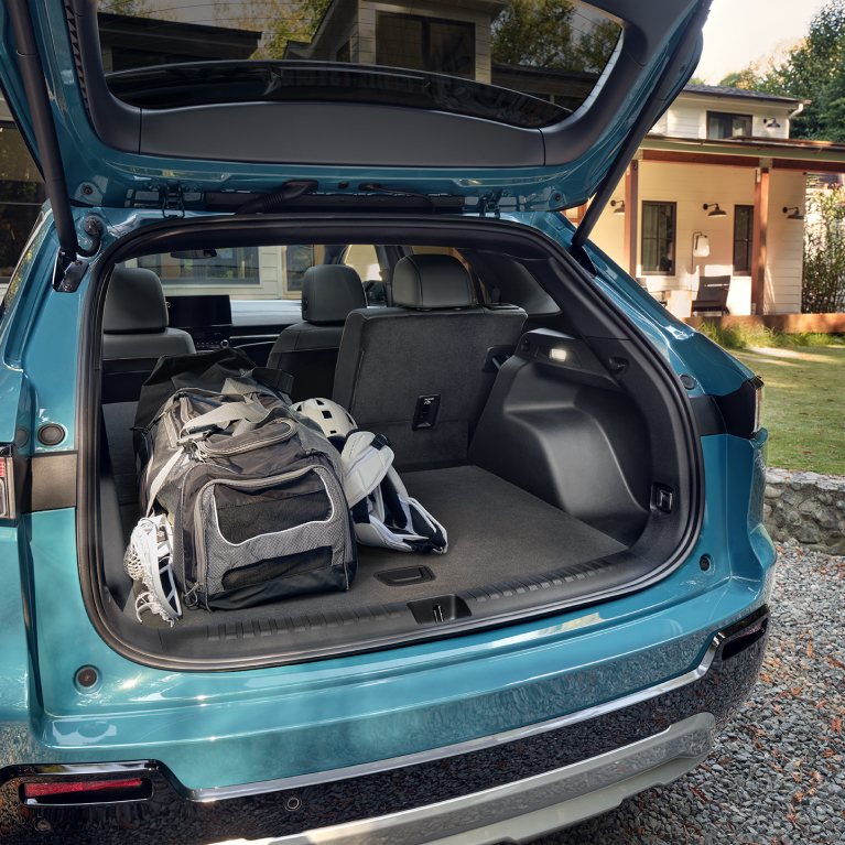 Interior shot of the trunk with duffle bag.